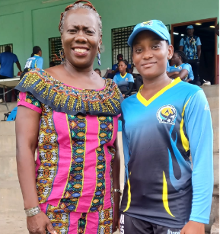 HALL OF FAMER PETAL SAMUELS WITH CWI PLAYER IN GRENADA